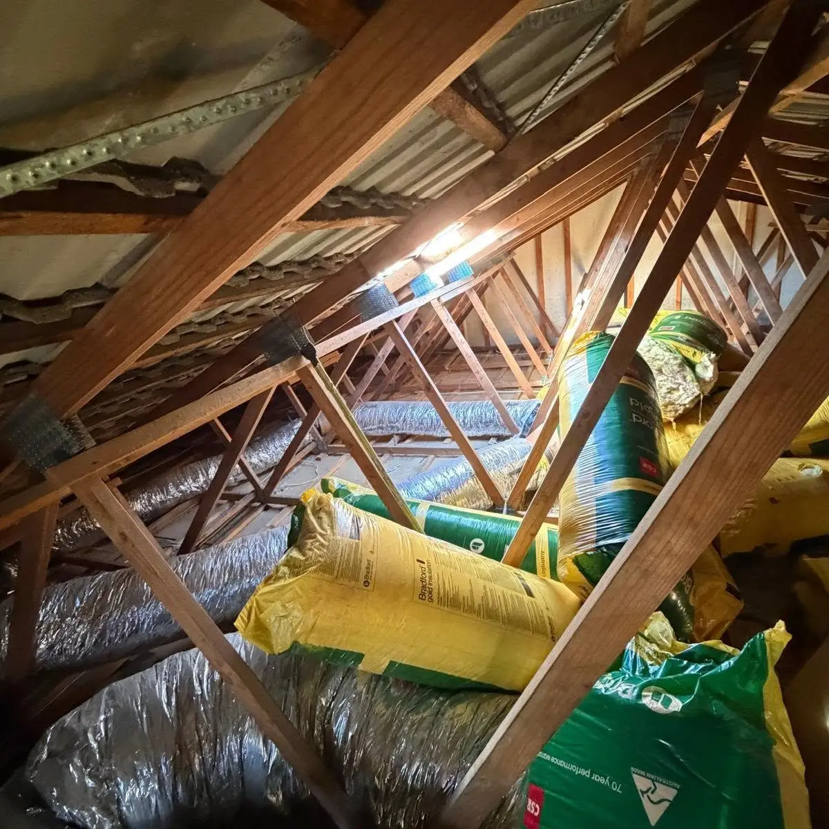 Freshly installed ceiling insulation in a Canberra roof space
